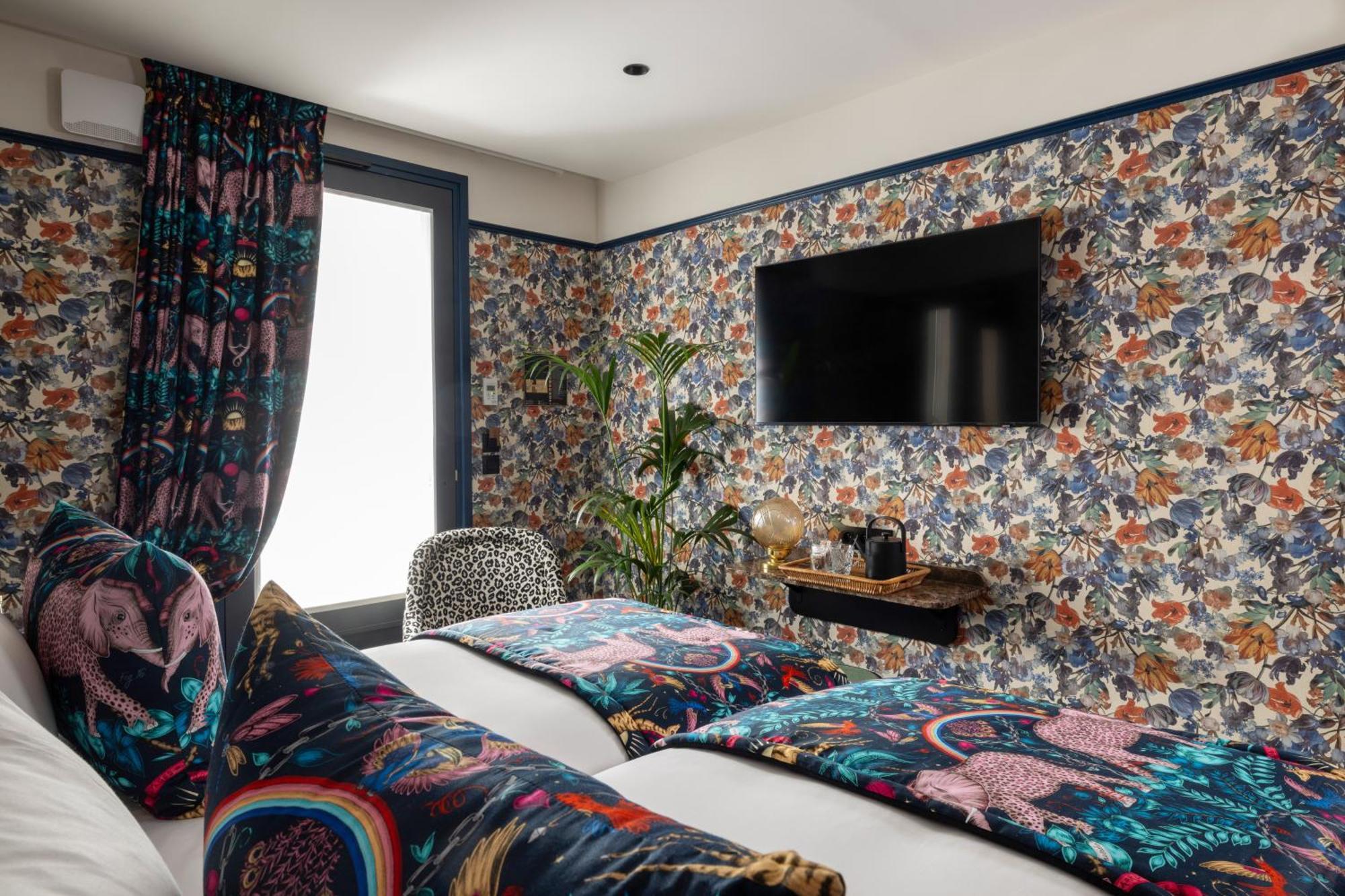 Hotel Ginette A La Folie & Spa Parigi Esterno foto